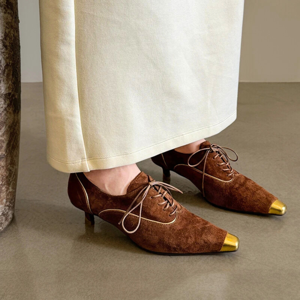 Punta Oro Pumps