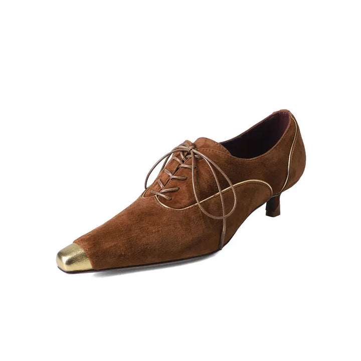 Punta Oro Pumps