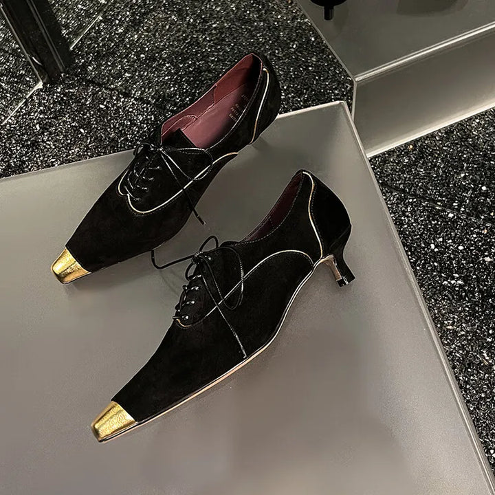 Punta Oro Pumps