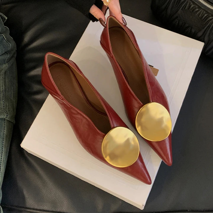 Icon Disc Point Pumps