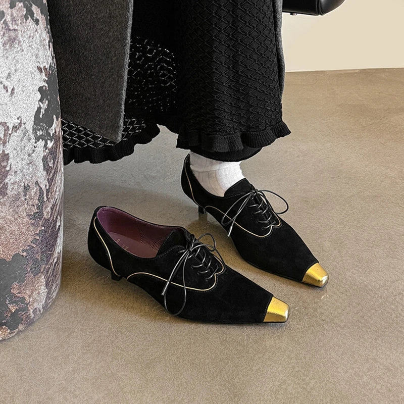 Punta Oro Pumps
