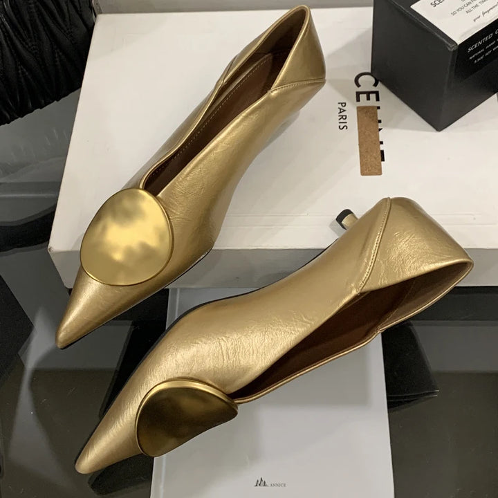 Icon Disc Point Pumps