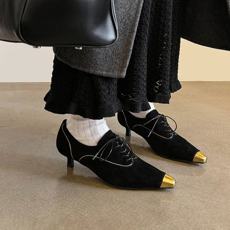 Punta Oro Pumps