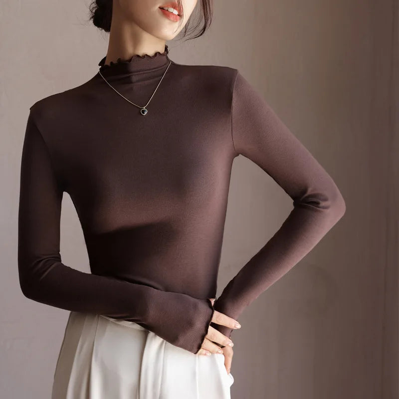 Softline Ruffle Turtleneck